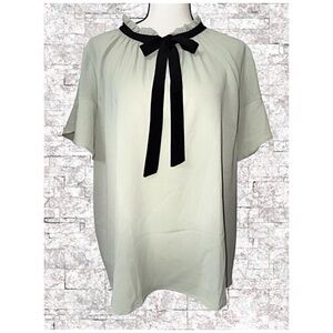 LIGHT GREEN BLOUSE WITH RIBBON TIE AT THE NECKLINE
